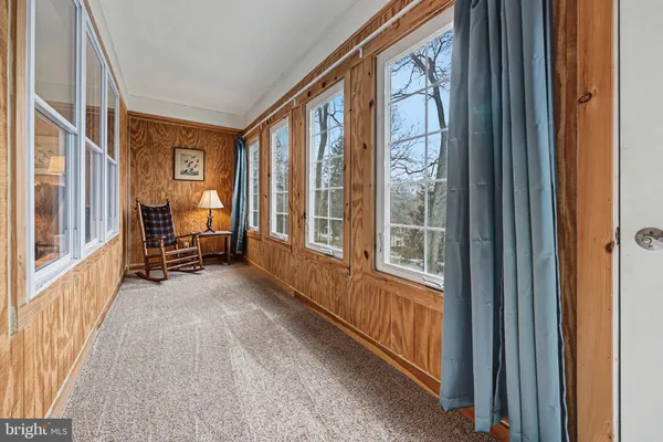 a view of an entryway with livingroom