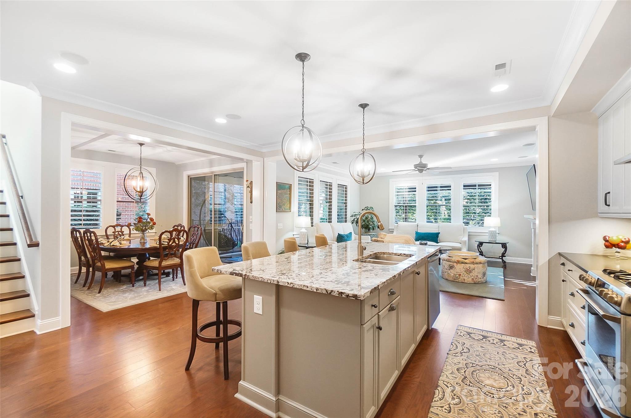 8614 Preserve Pond Road Cornelius, NC 28031 - Photo 14 of 48 a large kitchen with kitchen island a large island in it