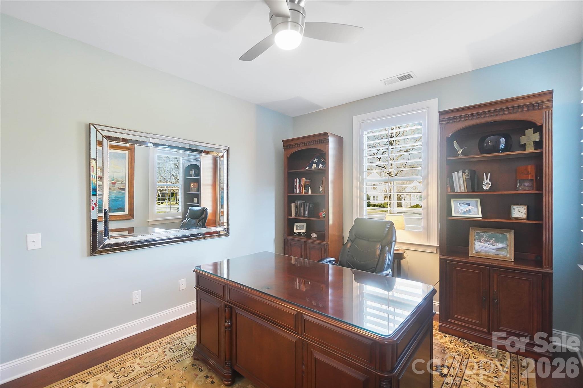 8614 Preserve Pond Road Cornelius, NC 28031 - Photo 23 of 48 a work room with furniture and wooden floor