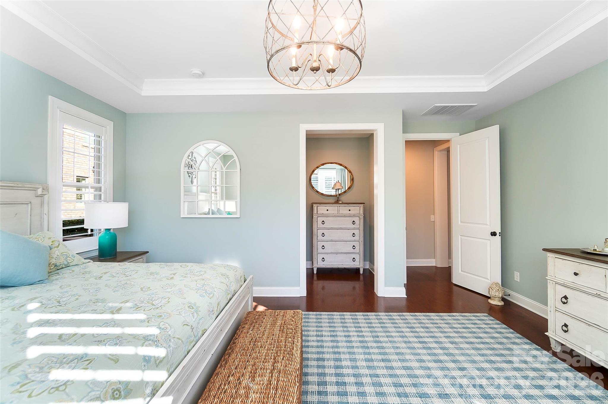 8614 Preserve Pond Road Cornelius, NC 28031 - Photo 26 of 48 a bedroom with a bed and window