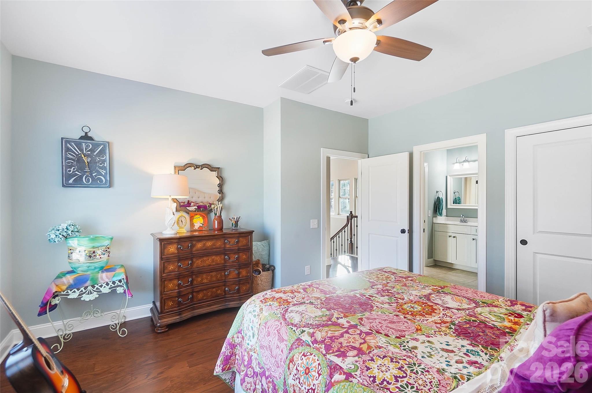 8614 Preserve Pond Road Cornelius, NC 28031 - Photo 35 of 48 a bedroom with a bed and cabinets