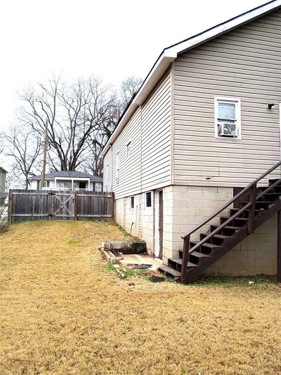 111 Griffin Street Northwest Atlanta, GA 30314 - Photo 8 of 9 a view of a house with snow on the road