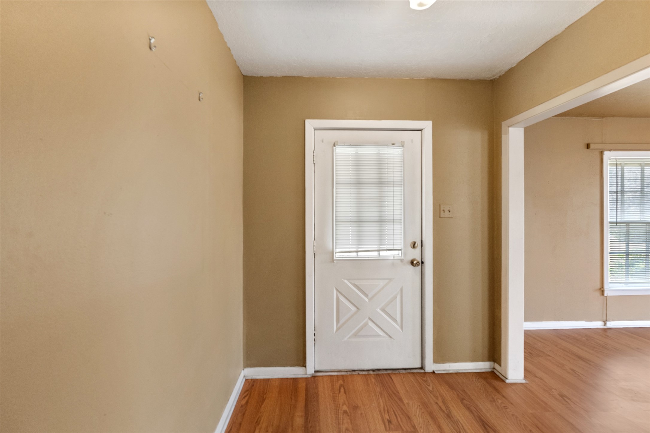 810 Main Street Hempstead, TX 77445 - Photo 16 of 32 Convenient entry area with direct exterior access and adjoining storage space.