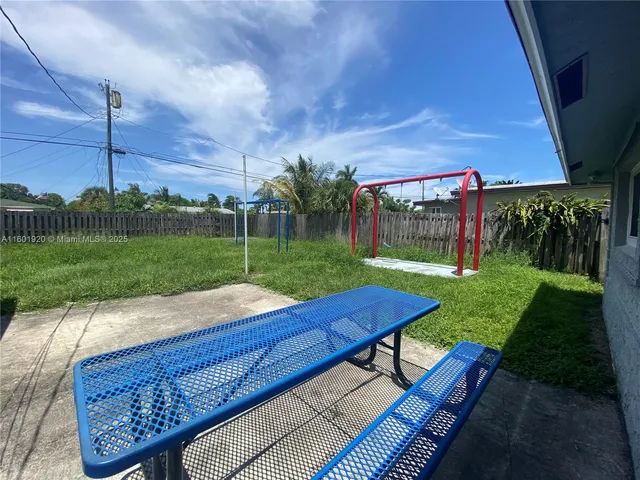 a bathroom with a sink a toilet and a shower
