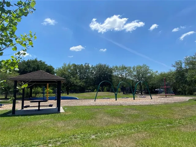 a view of a lake and sunset