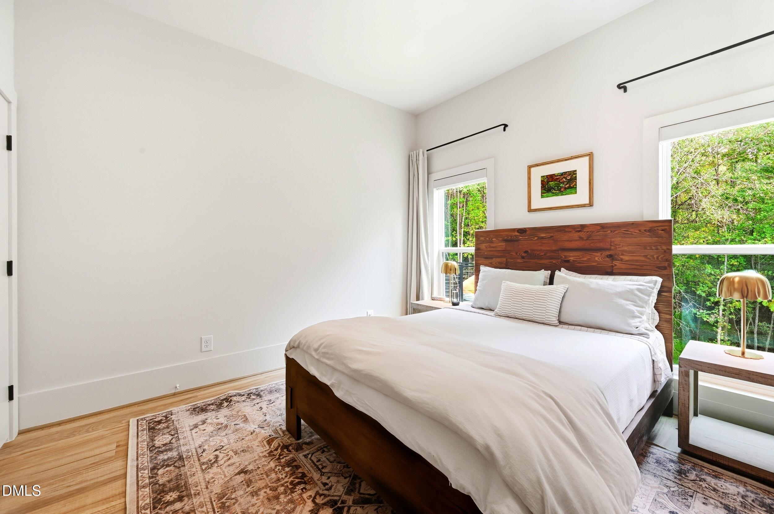 1459 Hawkins Road Hurdle Mills, NC 27541 - Photo 20 of 36 a bedroom with a bed and a window