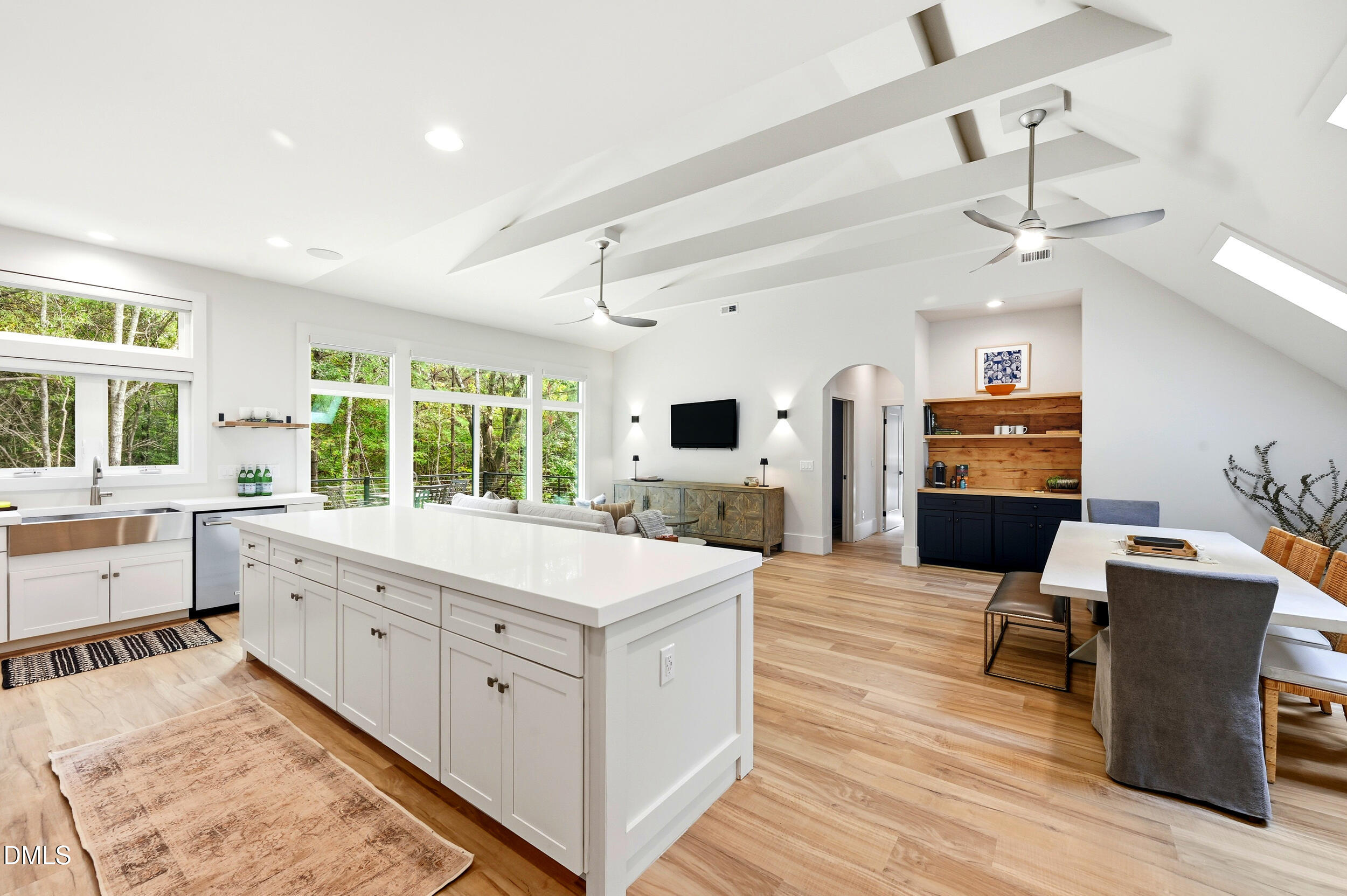 1459 Hawkins Road Hurdle Mills, NC 27541 - Photo 3 of 36 a large white kitchen with a large window