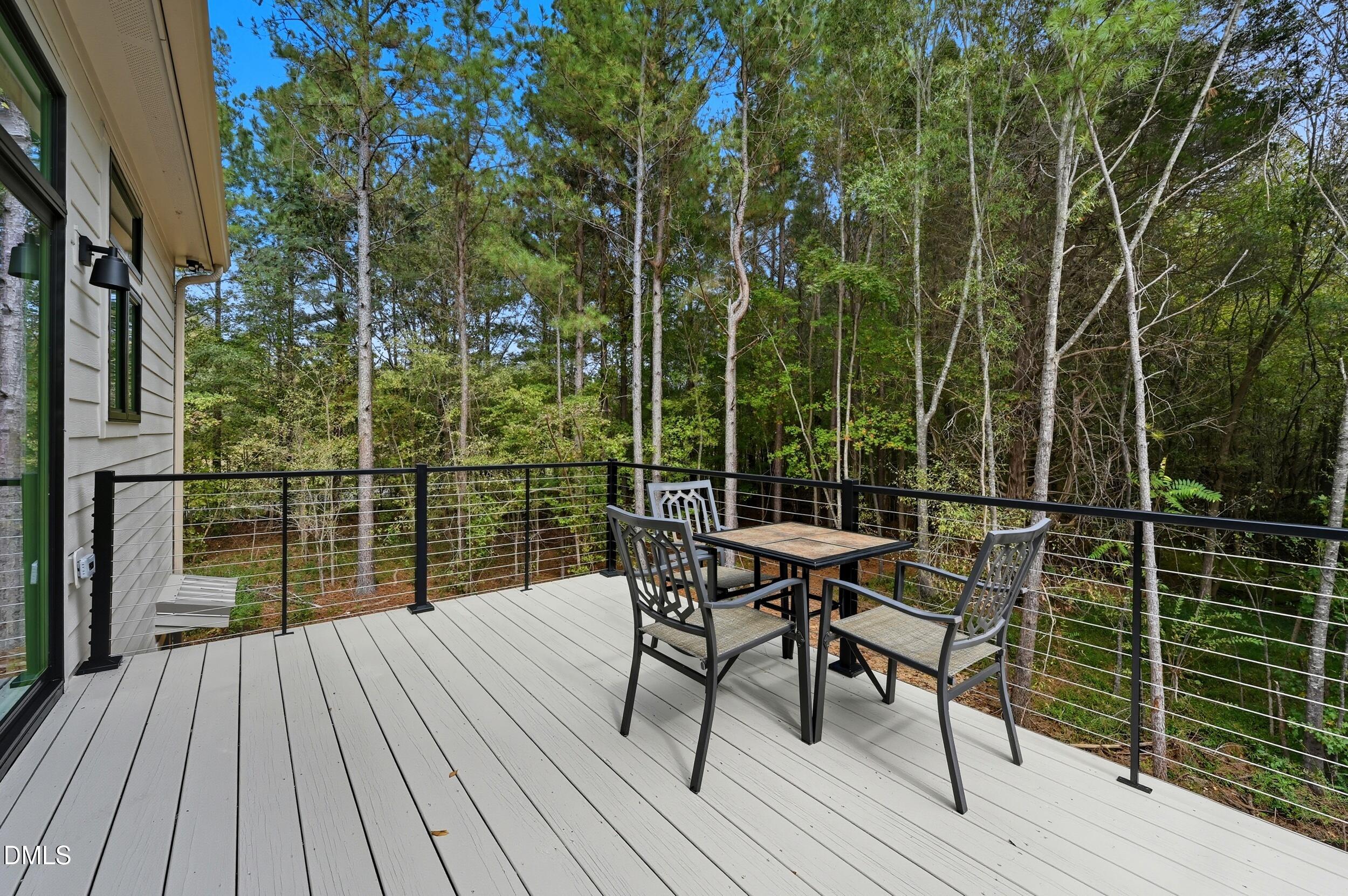 1459 Hawkins Road Hurdle Mills, NC 27541 - Photo 6 of 36 a view of roof deck with patio