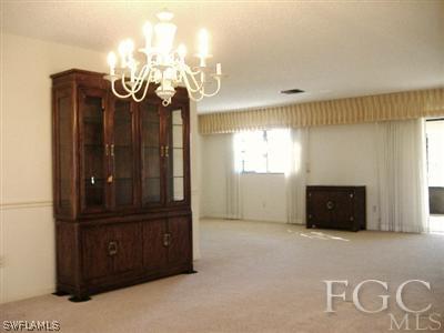 6916 Winkler Road Fort Myers, FL 33919 - Photo 6 of 10 a view of a room with window closet and windows