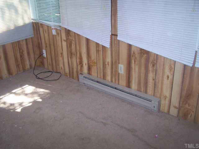 2717 Wyncote Drive Raleigh, NC 27603 - Photo 3 of 9 a view of wooden fence