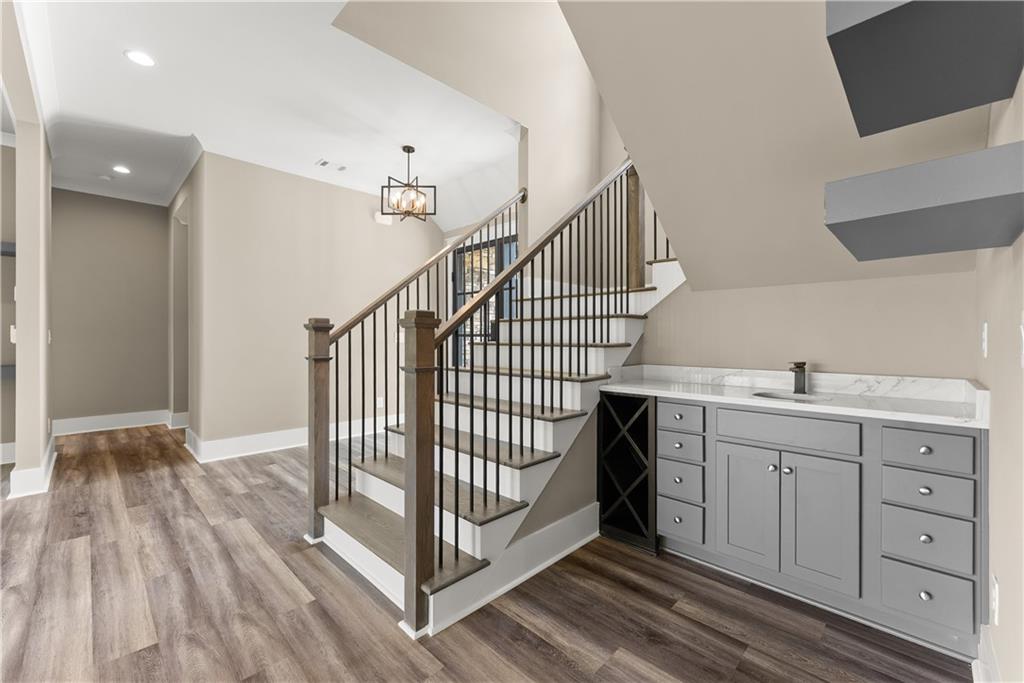 2275 Dr Bramblett Road Cumming, GA 30028 - Photo 15 of 78 a view of entryway and hall with wooden floor