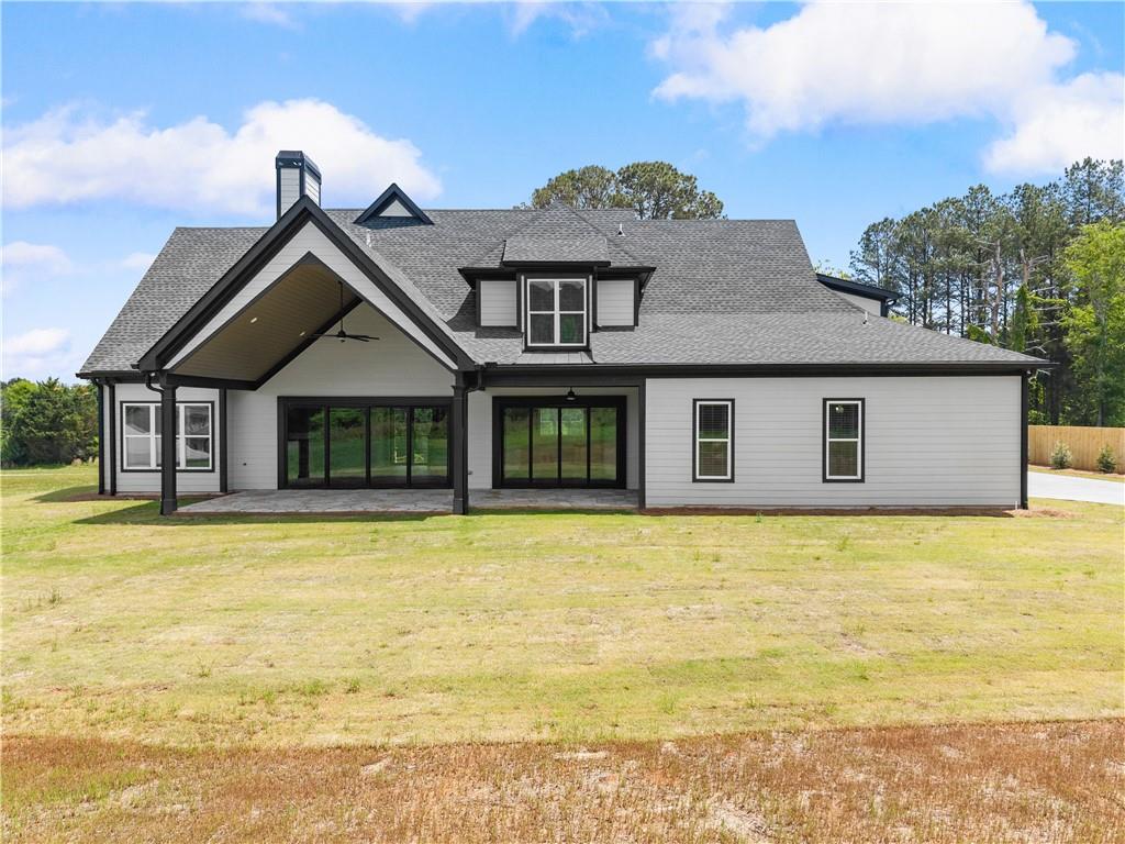 2275 Dr Bramblett Road Cumming, GA 30028 - Photo 64 of 78 a front view of a house with a swimming pool