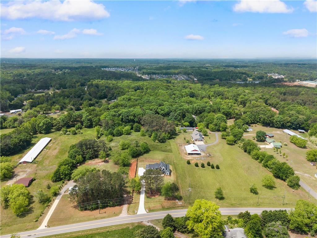 2275 Dr Bramblett Road Cumming, GA 30028 - Photo 74 of 78 an aerial view of residential houses with outdoor space and street view