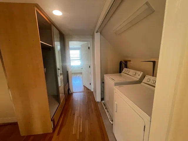 a view of a storage & utility room with washer and dryer
