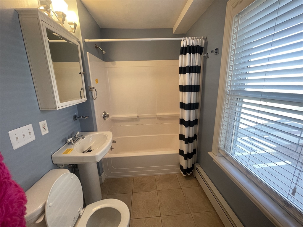363 Shrewsbury Street, Unit 2 Worcester, MA 01604 - Photo 17 of 20 a bathroom with a sink toilet and shower