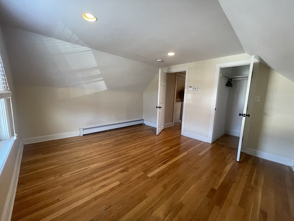 363 Shrewsbury Street, Unit 2 Worcester, MA 01604 - Photo 8 of 20 a view of empty room with wooden floor