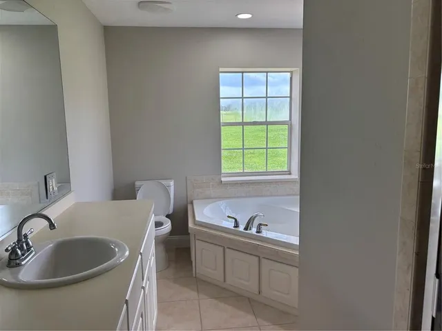 a bathroom with a sink and a bathtub