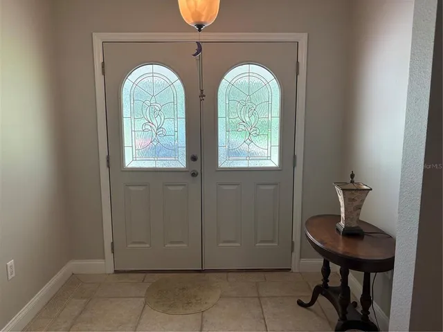 a view of room window and wooden floor