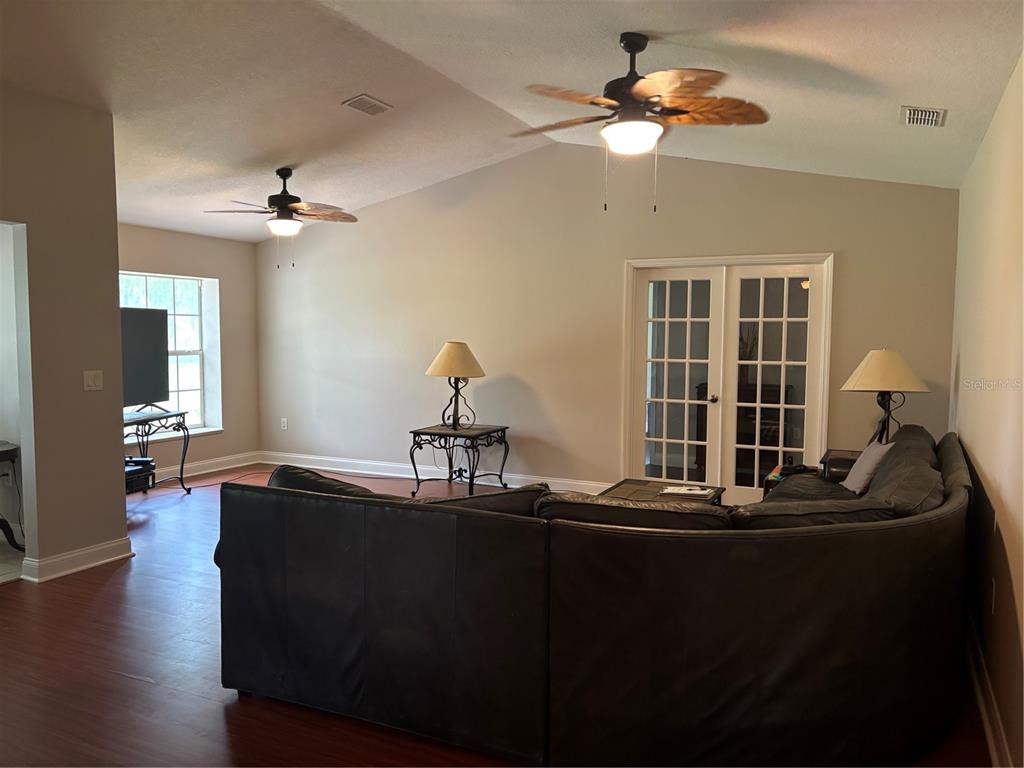 4641 Highway 98 Fort Meade, FL 33841 - Photo 7 of 14 a dining room with furniture and wooden floor