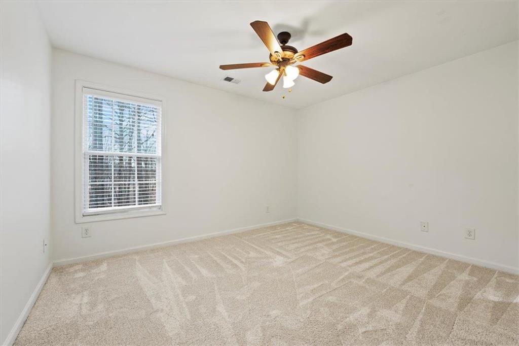 1218 Morgans Run Monroe, GA 30656 - Photo 23 of 39 an empty room with a window