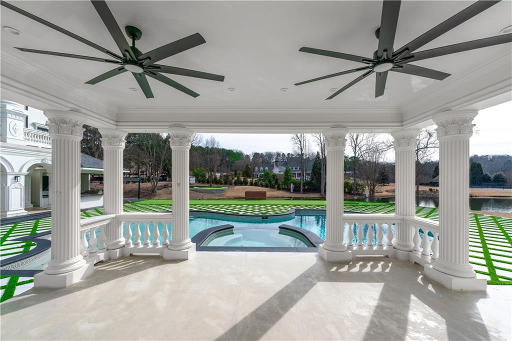10450 Belladrum Alpharetta, GA 30022 - Photo 17 of 95 a view of a porch with furniture and garden