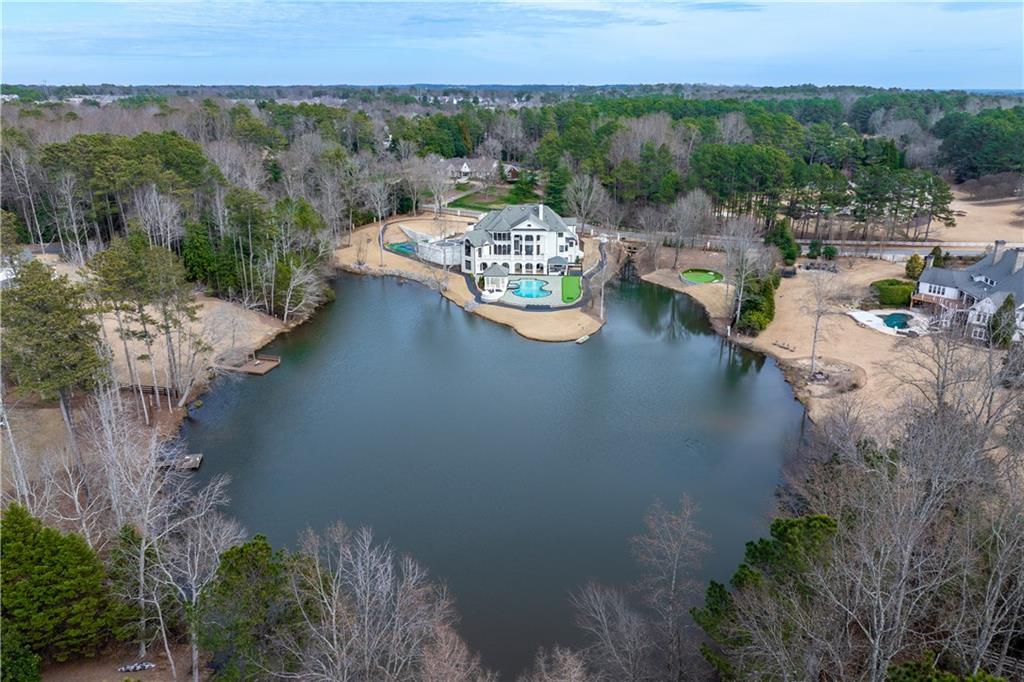 10450 Belladrum Alpharetta, GA 30022 - Photo 37 of 95 a view of a lake with mountain