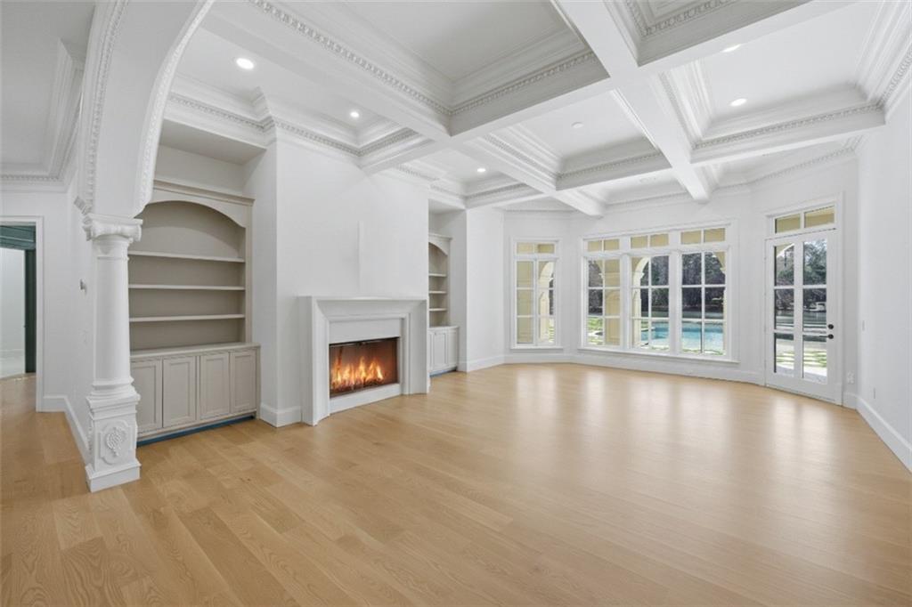 10450 Belladrum Alpharetta, GA 30022 - Photo 64 of 95 a view of an empty room with a fireplace and a window