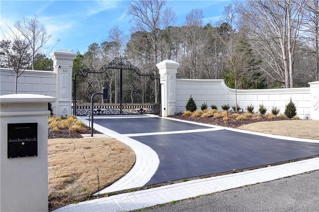 10450 Belladrum Alpharetta, GA 30022 - Photo 8 of 95 a view of a swimming pool with an outdoor seating