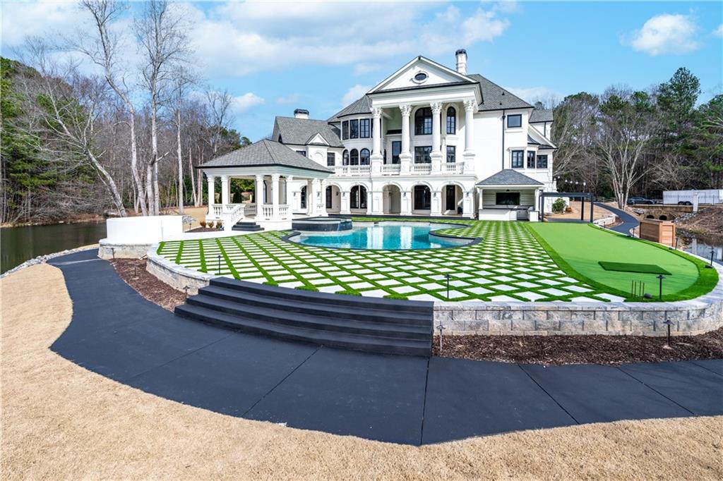 10450 Belladrum Alpharetta, GA 30022 - Photo 89 of 95 a front view of a house with a yard