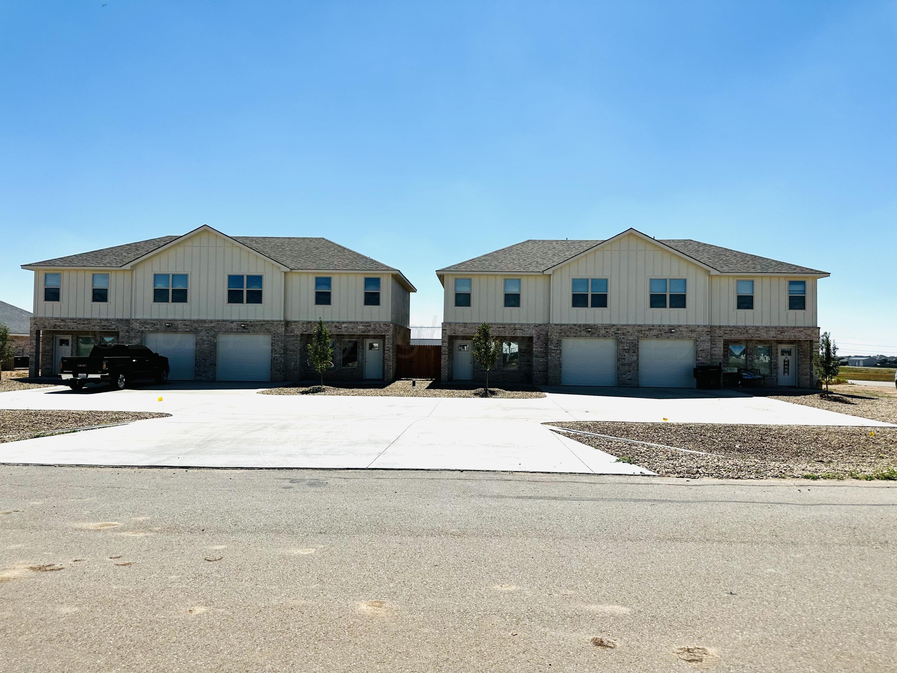 14007 Hawksbeard Place Amarillo, TX 79119 - Photo 1 of 18 a front view of a house with a yard