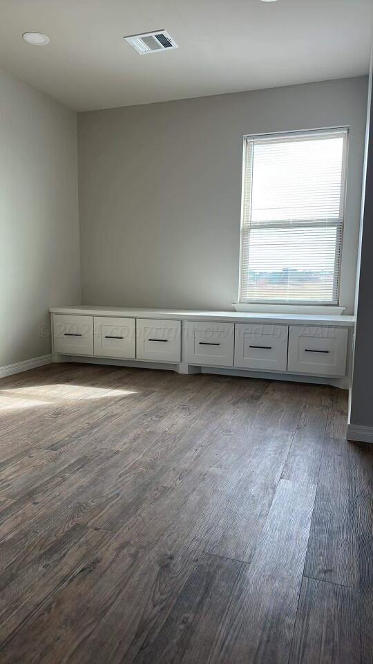 14007 Hawksbeard Place Amarillo, TX 79119 - Photo 14 of 18 wooden floor and window in a room
