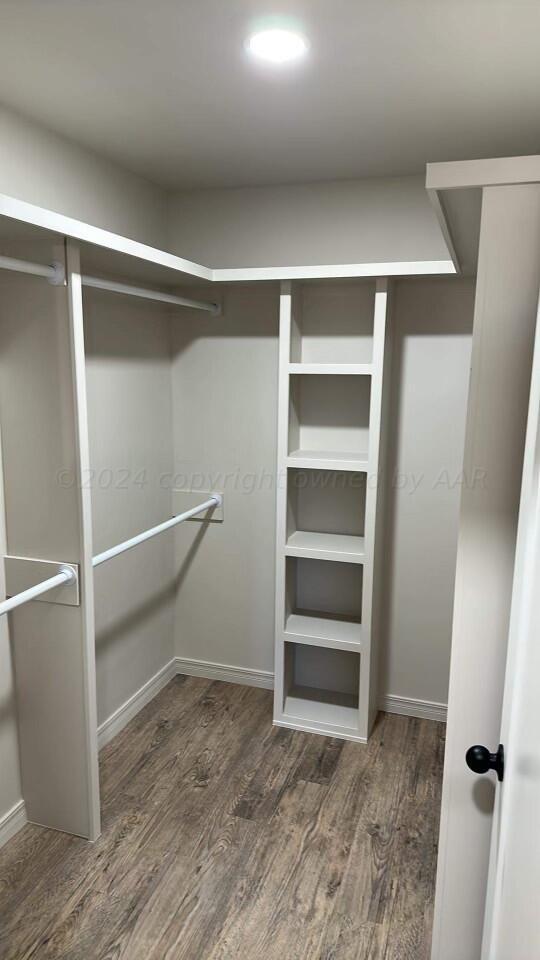 14007 Hawksbeard Place Amarillo, TX 79119 - Photo 16 of 18 a view of an empty walk in closet