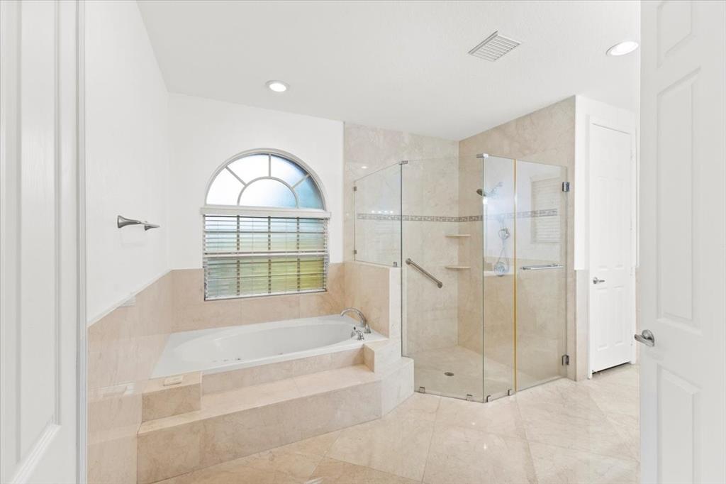 Undisclosed Address Davie, FL 33314 - Photo 20 of 38 a spacious bathroom with a tub and shower