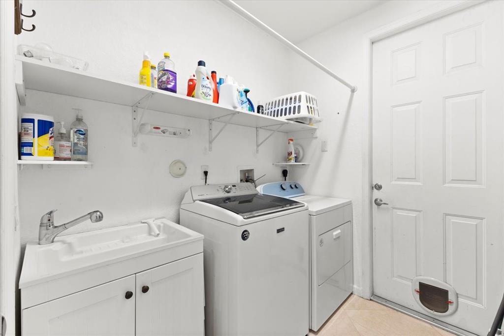 Undisclosed Address Davie, FL 33314 - Photo 30 of 38 a utility room with dryer and washer