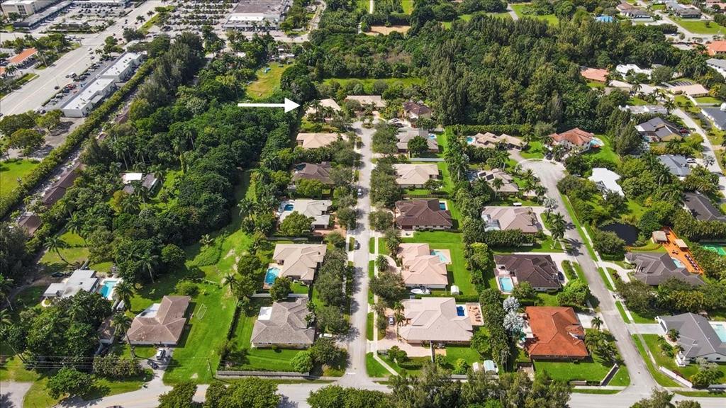 Undisclosed Address Davie, FL 33314 - Photo 35 of 38 an aerial view of residential houses with outdoor space and trees