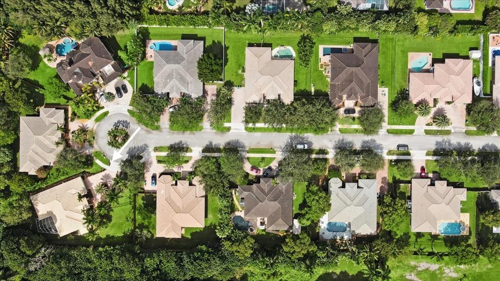 Undisclosed Address Davie, FL 33314 - Photo 36 of 38 an aerial view of multiple house