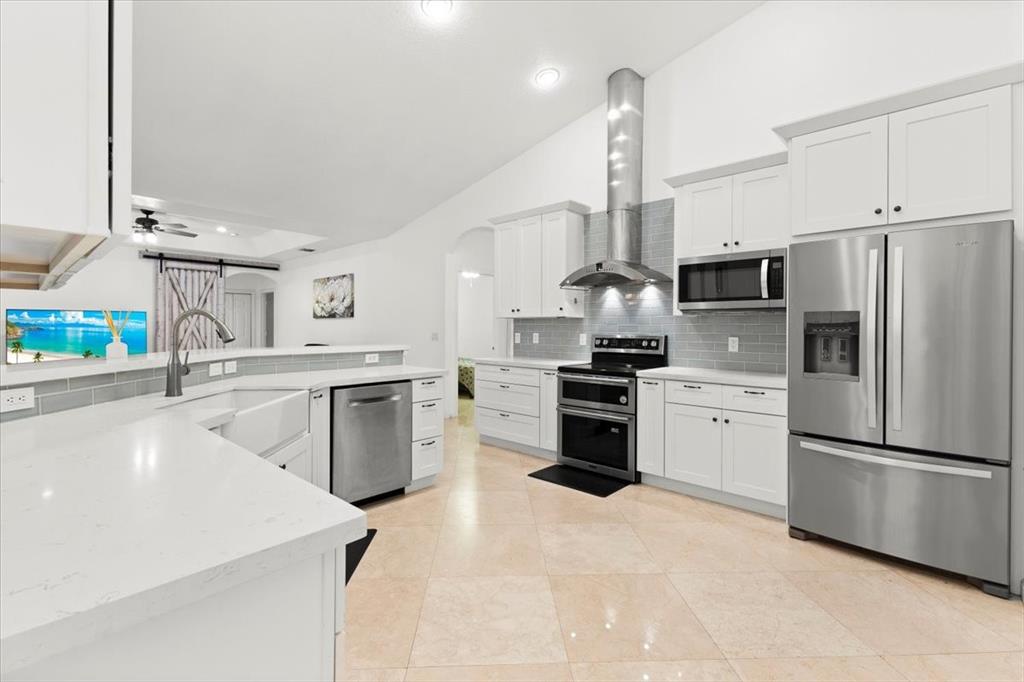 Undisclosed Address Davie, FL 33314 - Photo 10 of 38 a kitchen with a sink stainless steel appliances and counter space