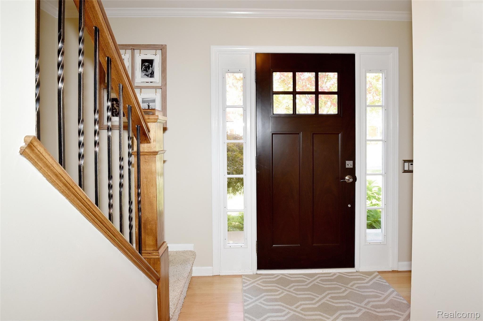 Foyer with beautiful front door