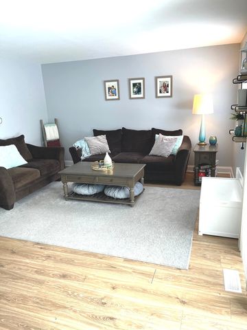 a living room with furniture and a couch