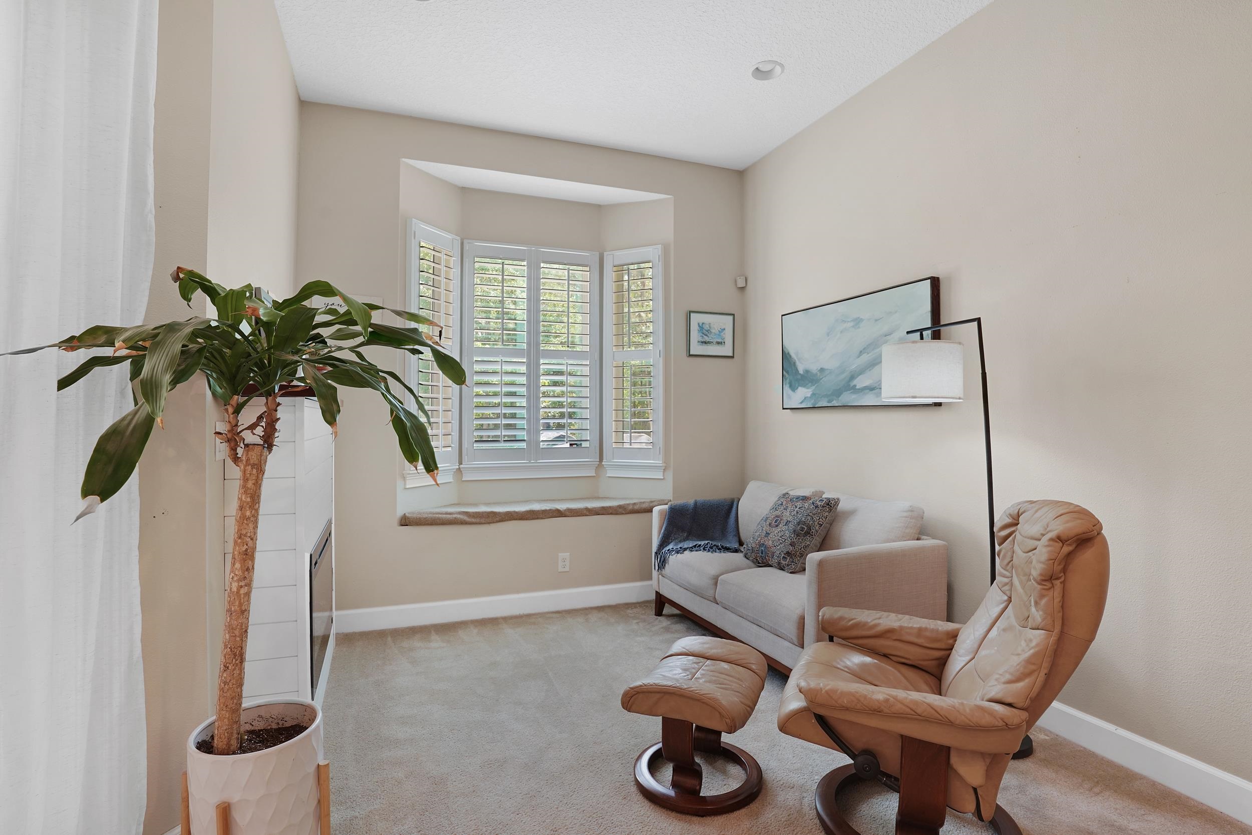 1308 Acorn Ridge Court St. Augustine, FL 32092 - Photo 21 of 47 a living room with furniture and a window