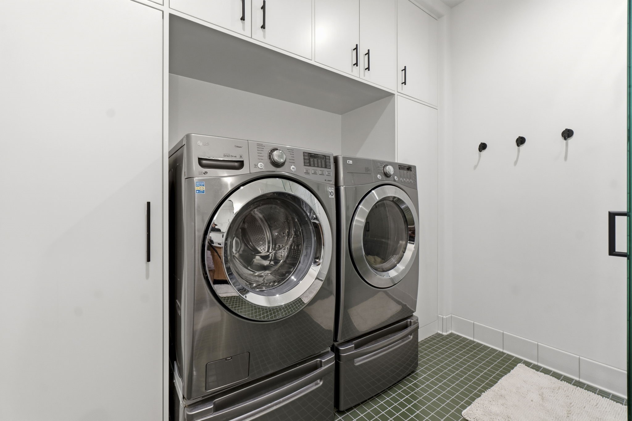2 Key Harbour Conroe, TX 77356 - Photo 18 of 41 a utility room with dryer and washer