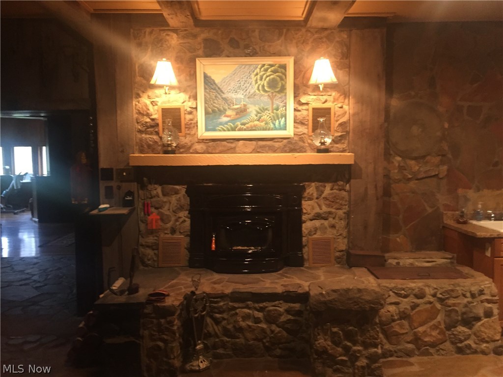 625 Warren Chapel Road Fleming, OH 45729 - Photo 18 of 35 stone fireplace in family room