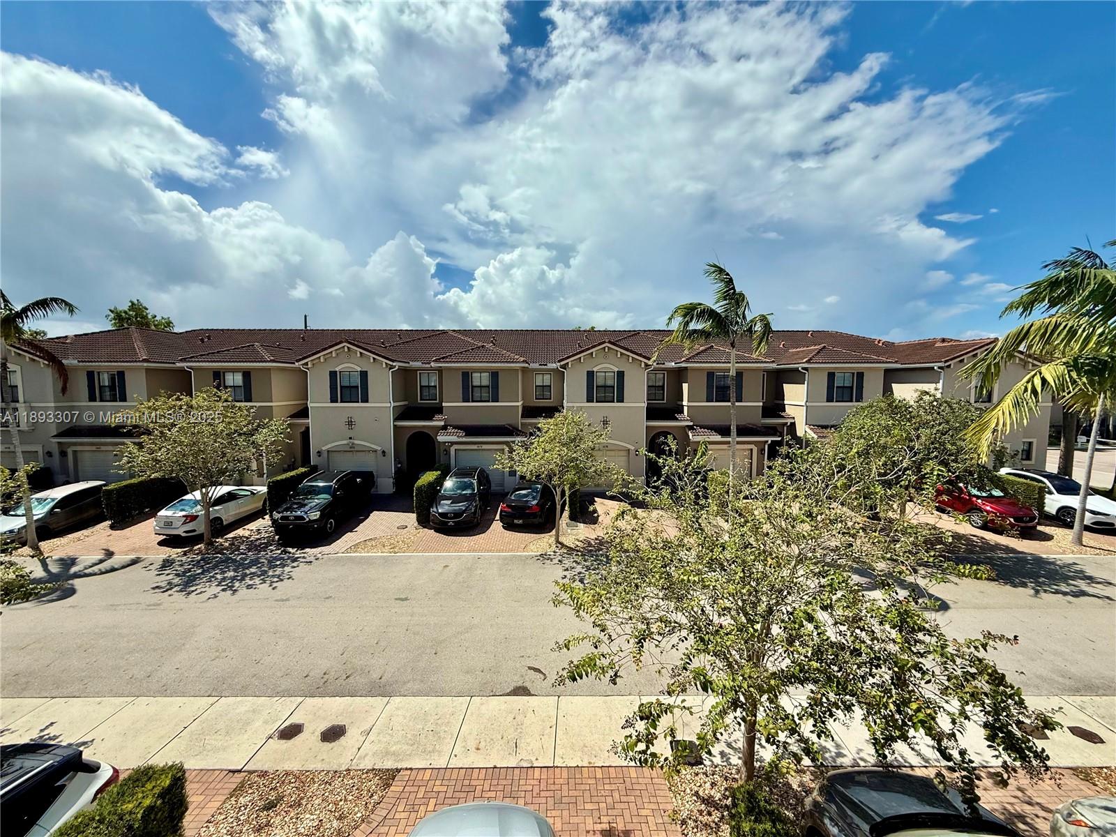 1075 Northwest 33rd Manor Pompano Beach, FL 33064 - Photo 16 of 27 an aerial view of a house
