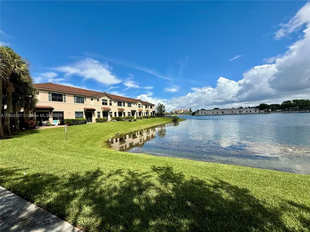 a view of a lake with houses