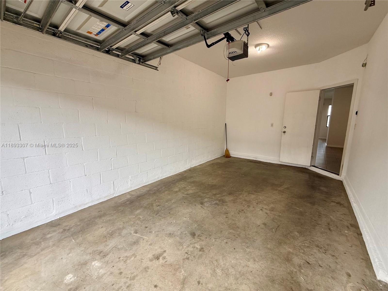 1075 Northwest 33rd Manor Pompano Beach, FL 33064 - Photo 22 of 27 a view of a room with an empty space