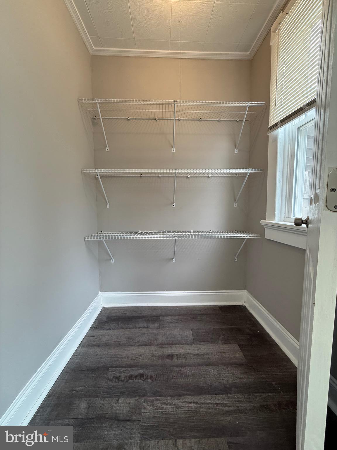 14 Franklin Street Frederick, MD 21701 - Photo 6 of 26 a view of a room with wooden floor