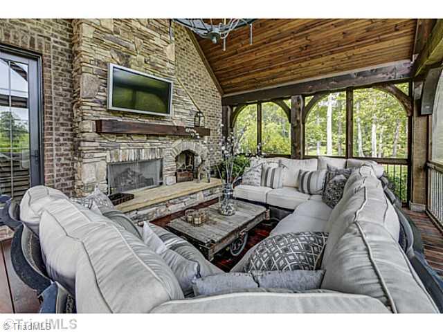 8488 Haw River Road Oak Ridge, NC 27310 - Photo 10 of 16 Enclosed Porch.