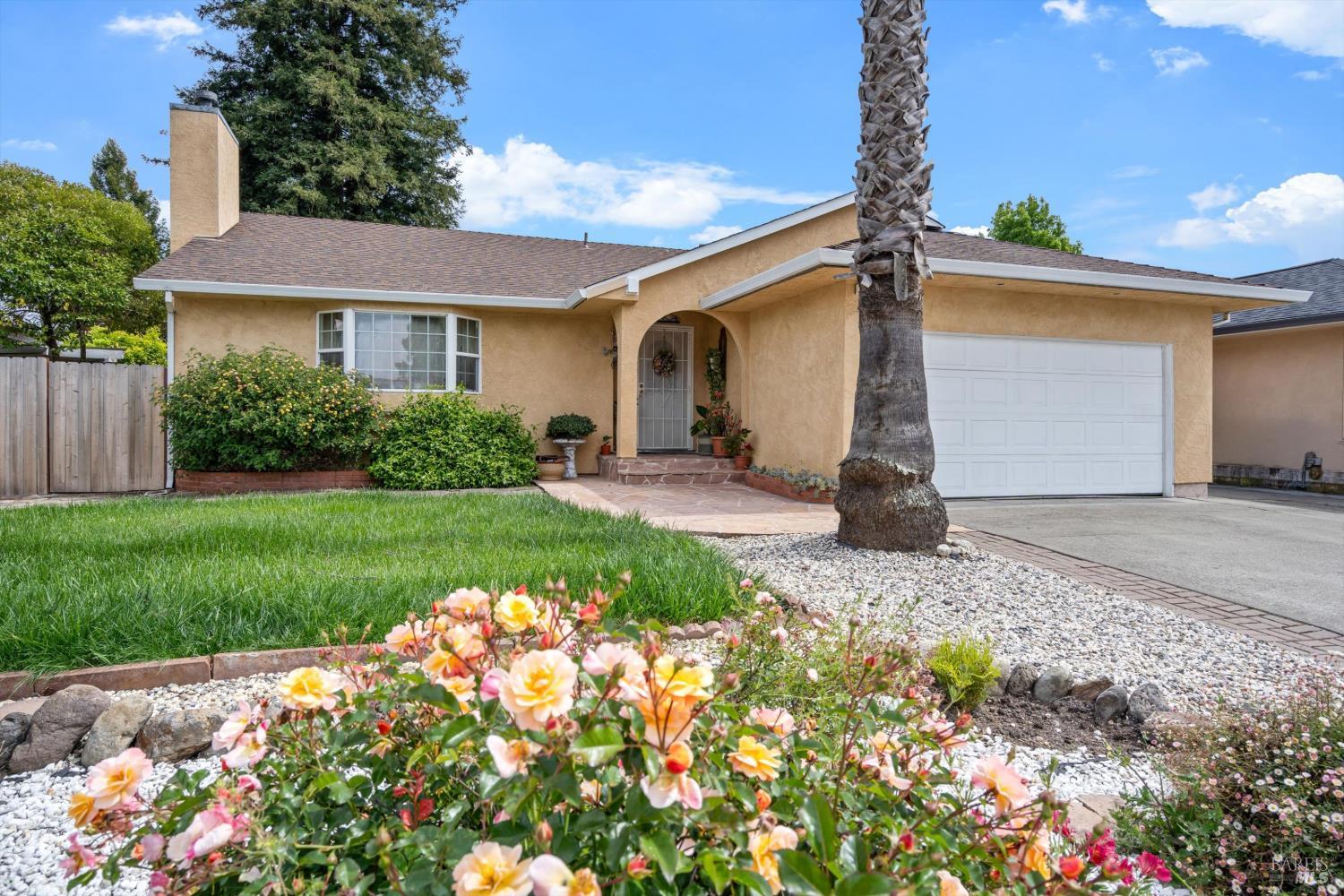 971 Eleanor Avenue Rohnert Park, CA 94928 - Photo 6 of 25 a front view of a house with garden