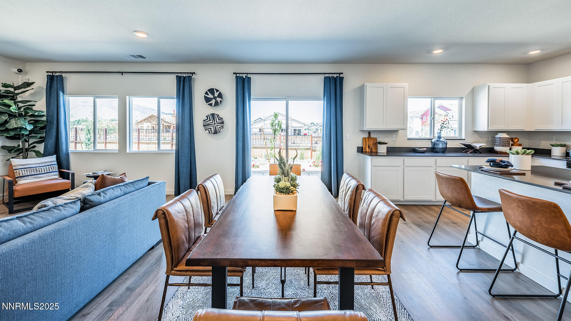 500 Russell Road Dayton, NV 89403 - Photo 3 of 25 a view of a a dining room with furniture window and wooden floor