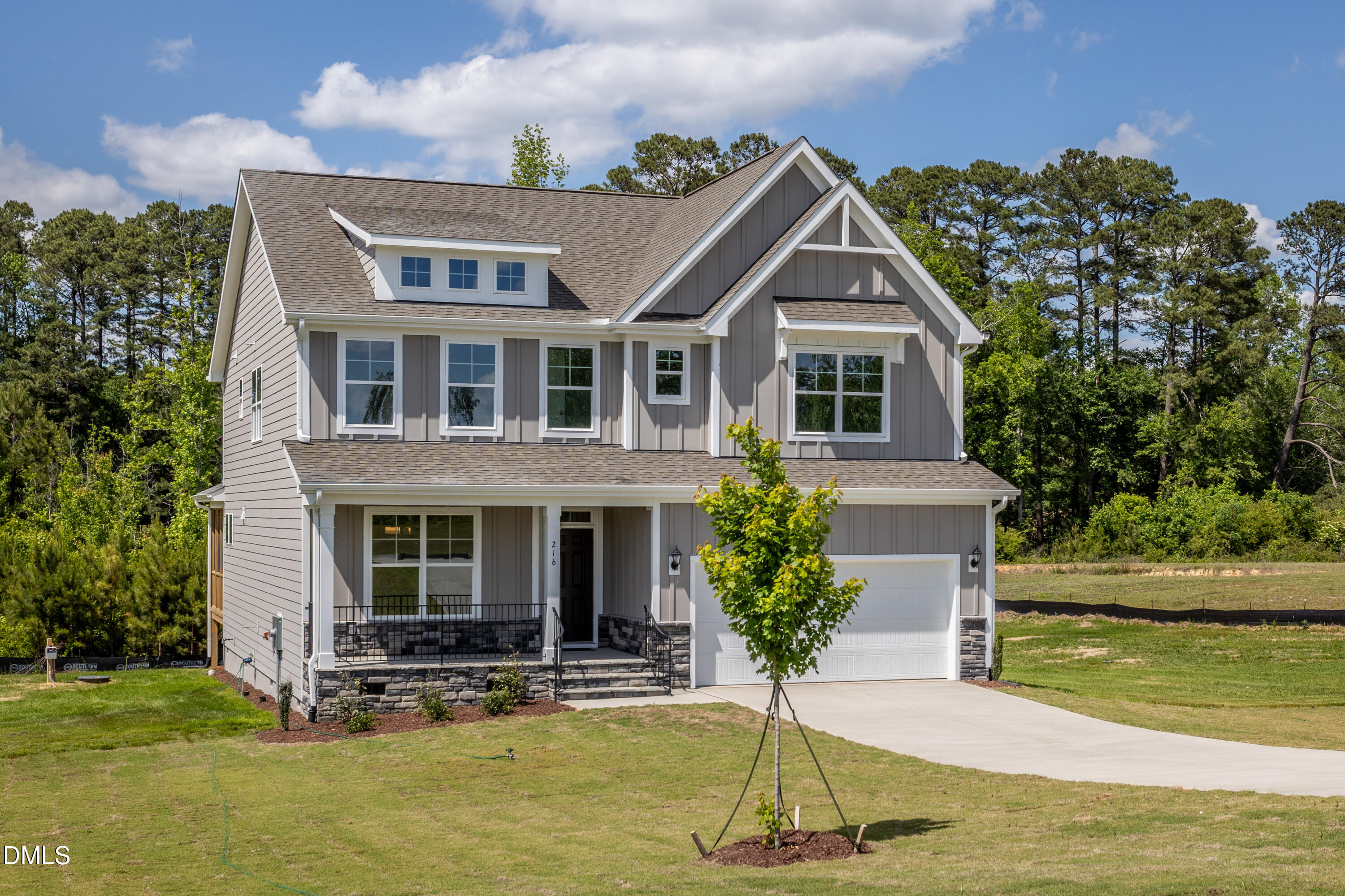 216 Cedar Rdg Trail Angier, NC 27501 - Photo 2 of 33 a front view of a house with a yard